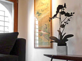 Black Orchid shaped aluminum silhouette on Carrara marble base